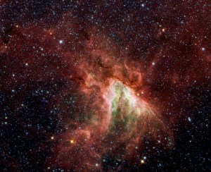 NASA's Spitzer Space Telescope has captured a new, infrared view of the choppy star-making cloud called M17, or the Swan nebula.