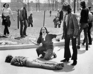 John Filo's iconic Pulitzer Prize-winning photograph of Mary Ann Vecchio, a fourteen-year-old runaway, kneeling over the dead body of Jeffrey Miller after he was shot by the National Guard.